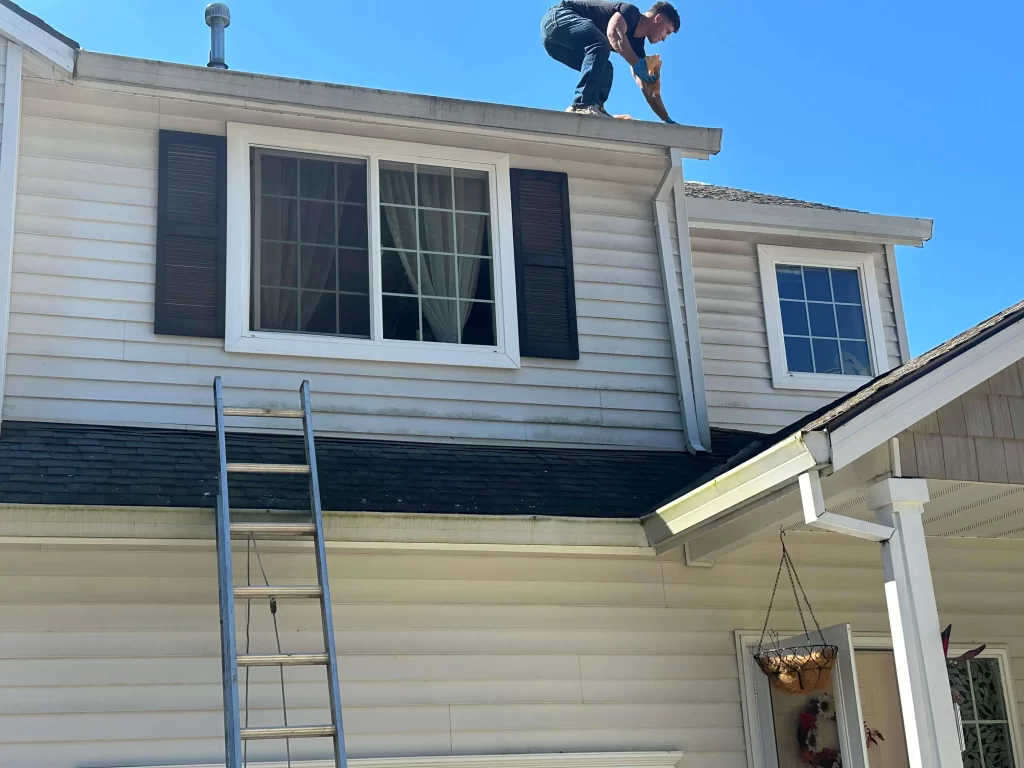 An ongoing residential gutter cleaning service in St. Helens by one of NJM Roof & Gutter cleaning members, Nathan